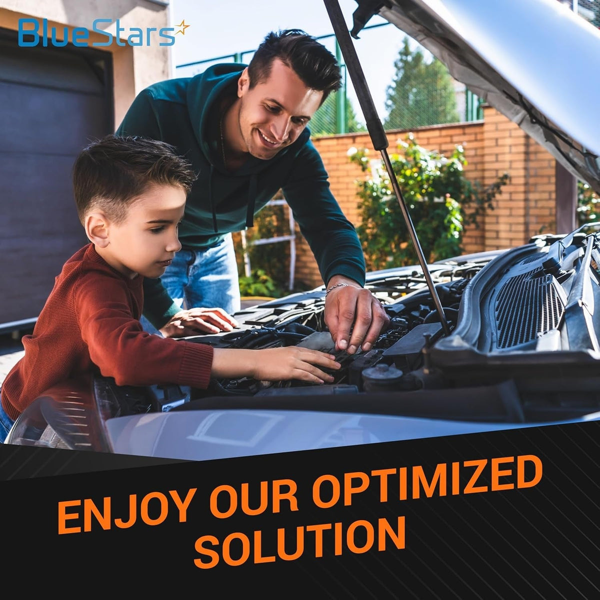 Father and son working together on car engine maintenance with BlueStars power distribution solution.