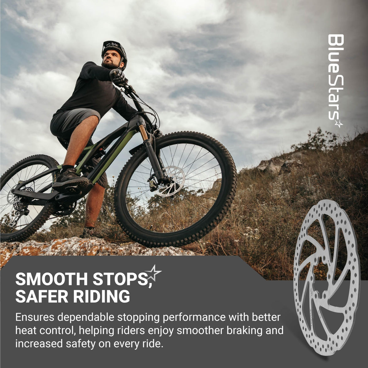 Mountain biker riding on a trail with a 160mm stainless steel disc brake rotor shown in the foreground.