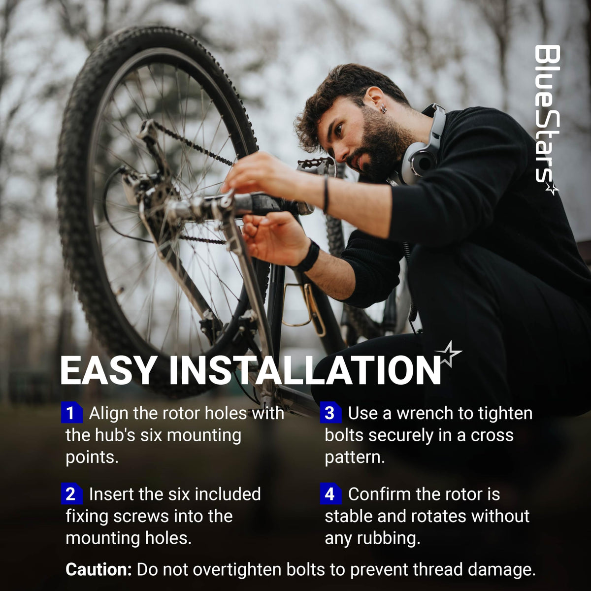 Cyclist installing a 160mm stainless steel disc brake rotor using 6 bolts on a mountain bike wheel.