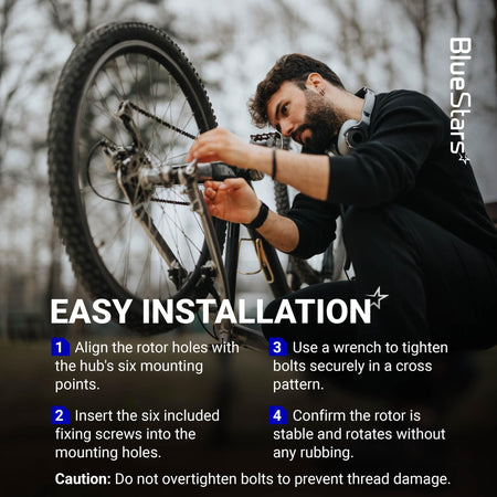 Cyclist installing a 160mm stainless steel disc brake rotor using 6 bolts on a mountain bike wheel.