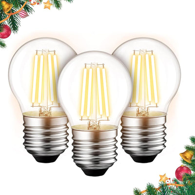Three G45 E26 Edison LED filament globe bulbs with clear glass and warm light, arranged in a festive holiday frame.