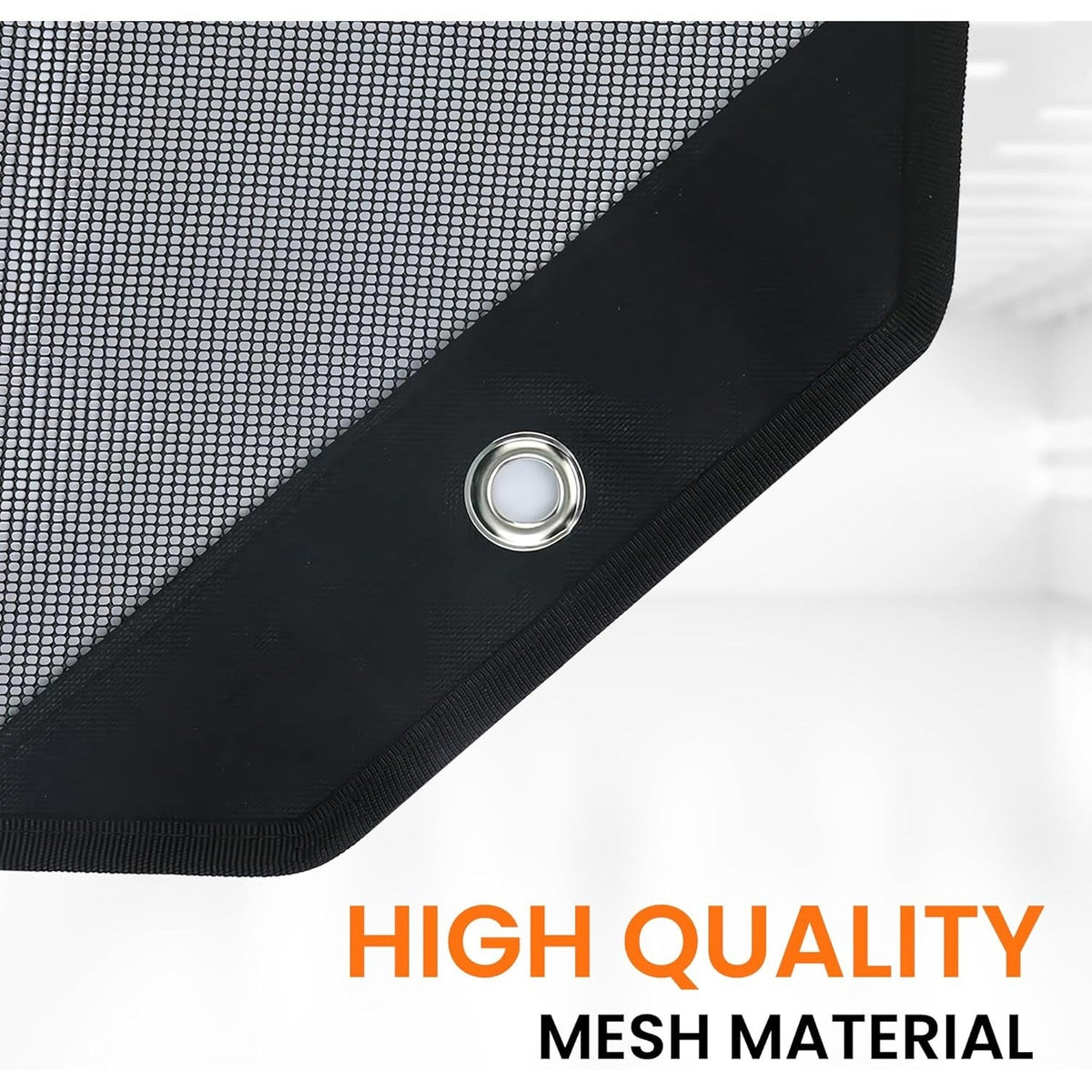 Close-up of 36-inch AC condenser mesh cover corner with reinforced black border and metal grommet.