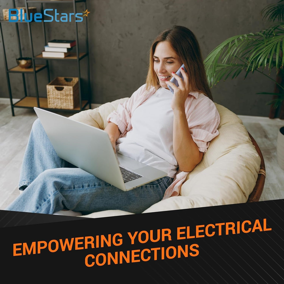 Woman using a laptop and phone in a living room to represent reliable power for electrical USB wall charger outlets.