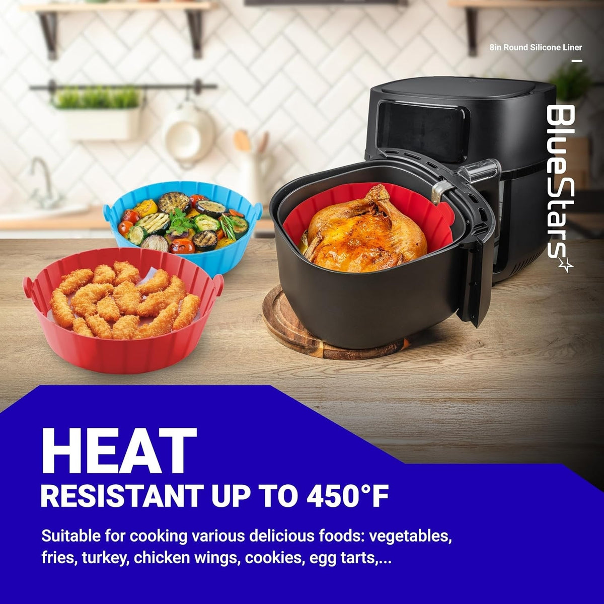 8-inch reusable silicone air fryer liners holding cooked chicken, vegetables, and snacks in a kitchen setting.