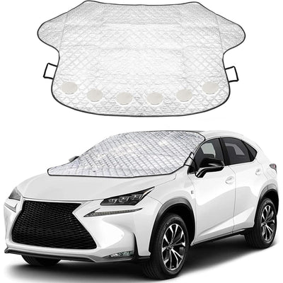 Silver quilted windshield cover for ice and snow protection installed on a white SUV.