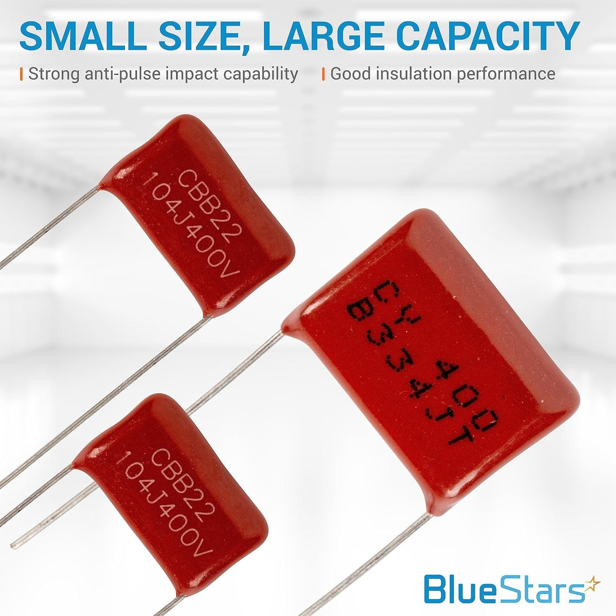 Three red CBB22 metallized polypropylene film DC capacitors with printed specifications.