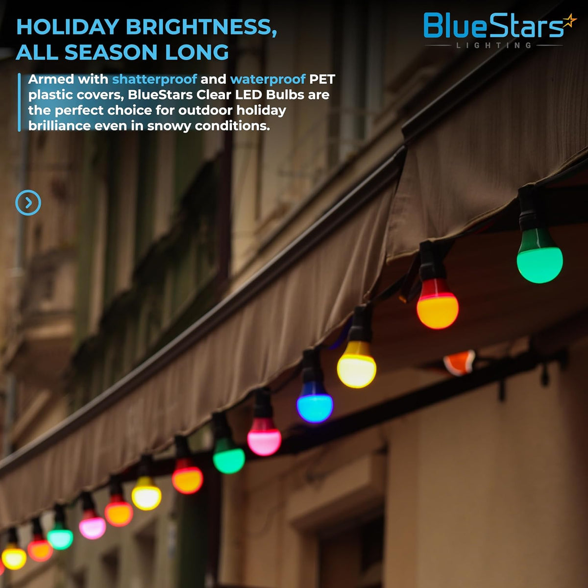 Multicolor C7 LED light bulbs hanging on an outdoor string light display for holiday decoration.