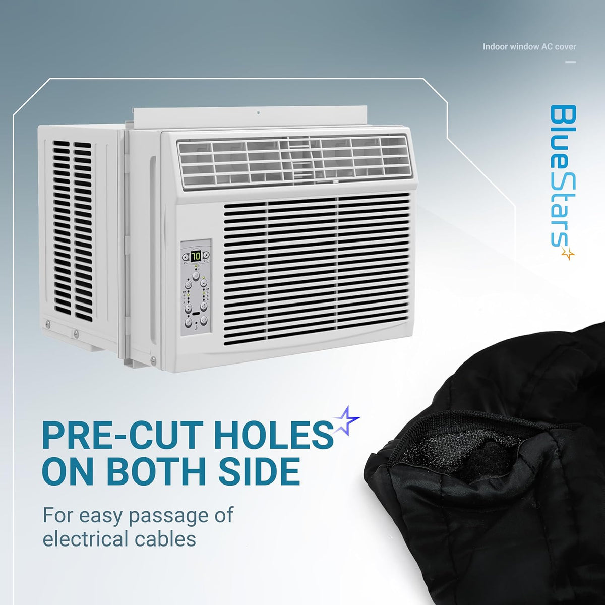 Black indoor window AC cover showing pre-cut side holes for electrical cables on a white air conditioner unit.