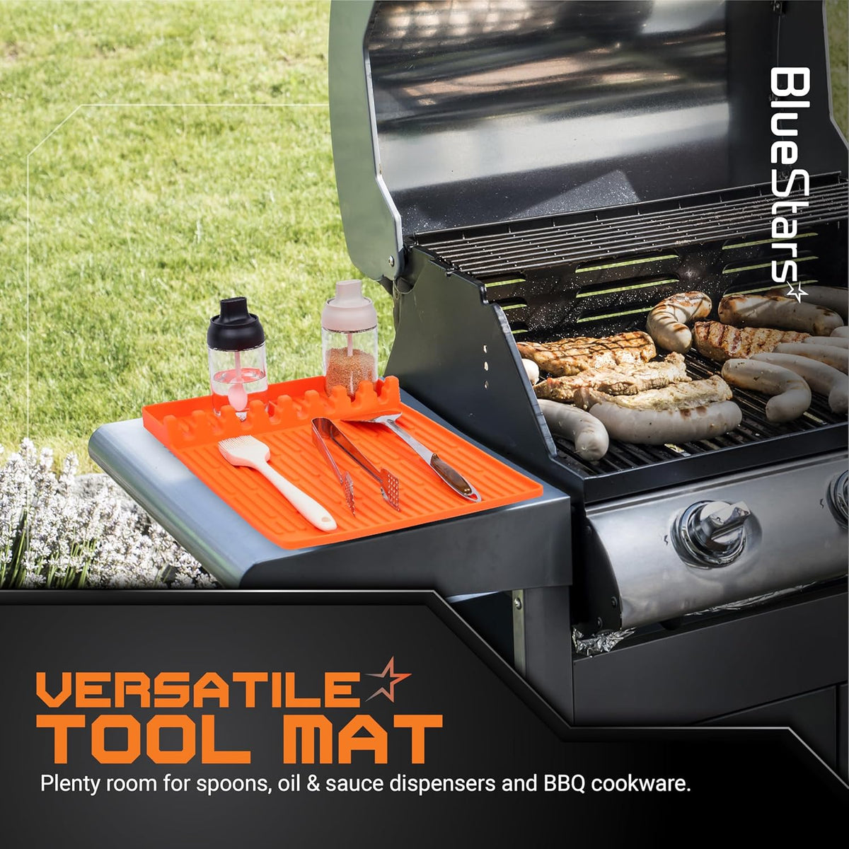 Orange silicone griddle mat holding BBQ tools and condiment dispensers on a grill side shelf.