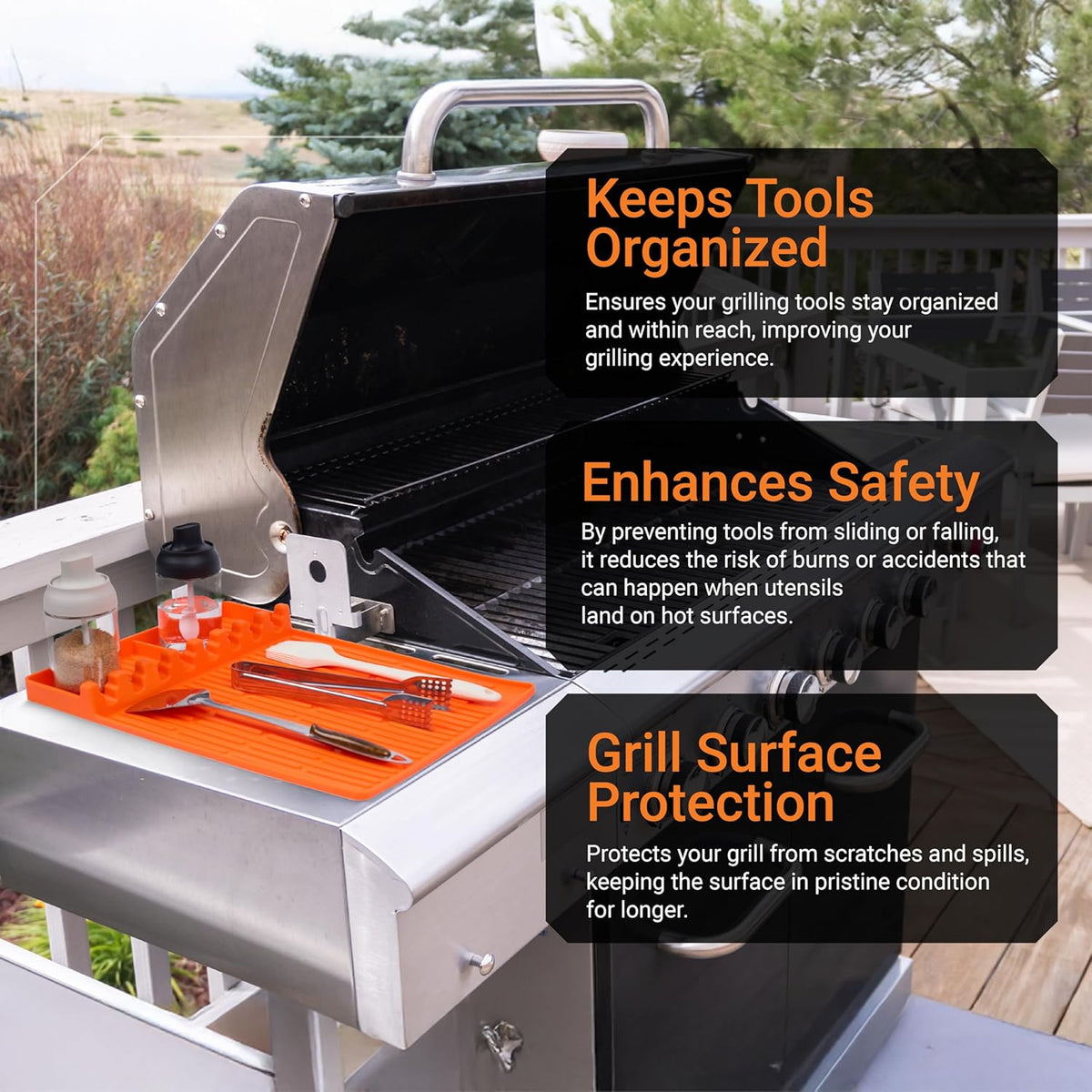 Orange silicone griddle mat holding grilling utensils and spice jars on a stainless steel grill side shelf.