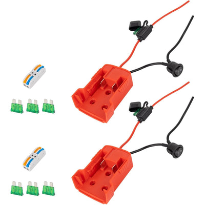 Two red Milwaukee M18 battery adapters for Power Wheels with fuse holders, switches, wire connectors, and 30A blade fuses.