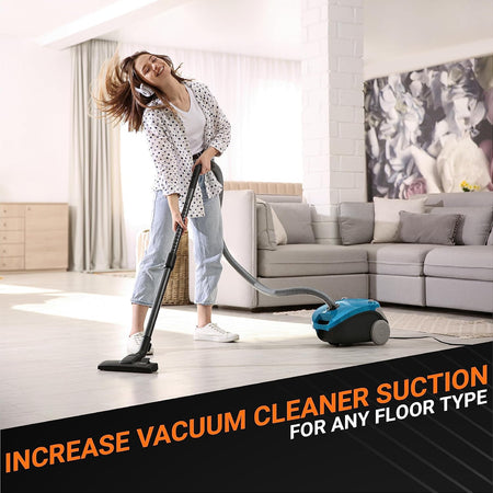 Woman using a shop vacuum in a living room to demonstrate improved suction power with a VF5000 replacement filter.