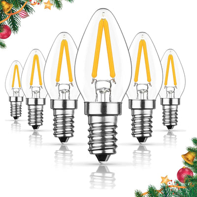 Set of six 3W C7 LED candelabra base light bulbs with clear glass and warm white filaments.