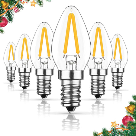 Set of six 3W C7 LED candelabra base light bulbs with clear glass and warm white filaments.