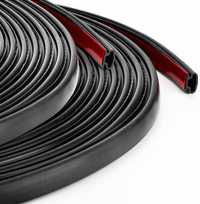 Coiled black weather stripping door seal with red adhesive backing.