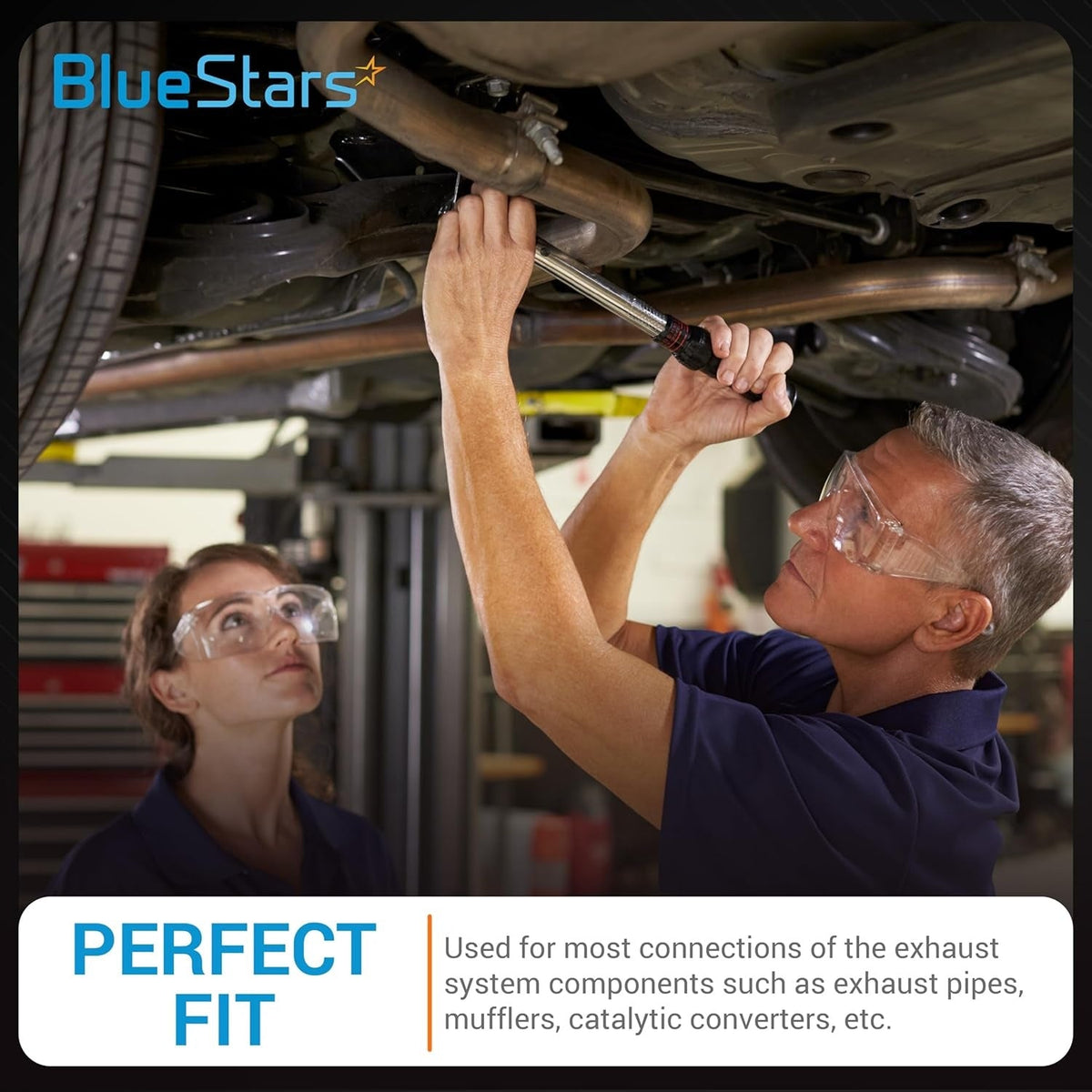 Mechanic installing a 3-inch narrow band exhaust clamp on a vehicle undercarriage using a torque wrench.