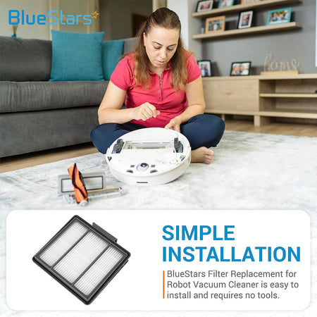 Woman installing a replacement HEPA filter into a Shark ION robot vacuum cleaner.