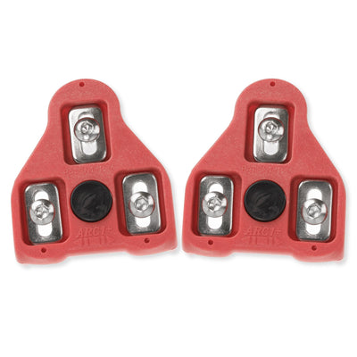 Pair of red 9-degree float bike cleats for Look Delta and Peloton pedals, showing the underside mounting hardware.