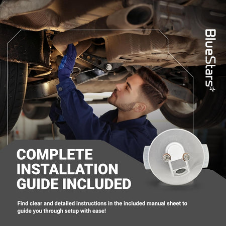 Mechanic installing F4TZ-6753-A dipstick adapter repair kit with included installation guide.