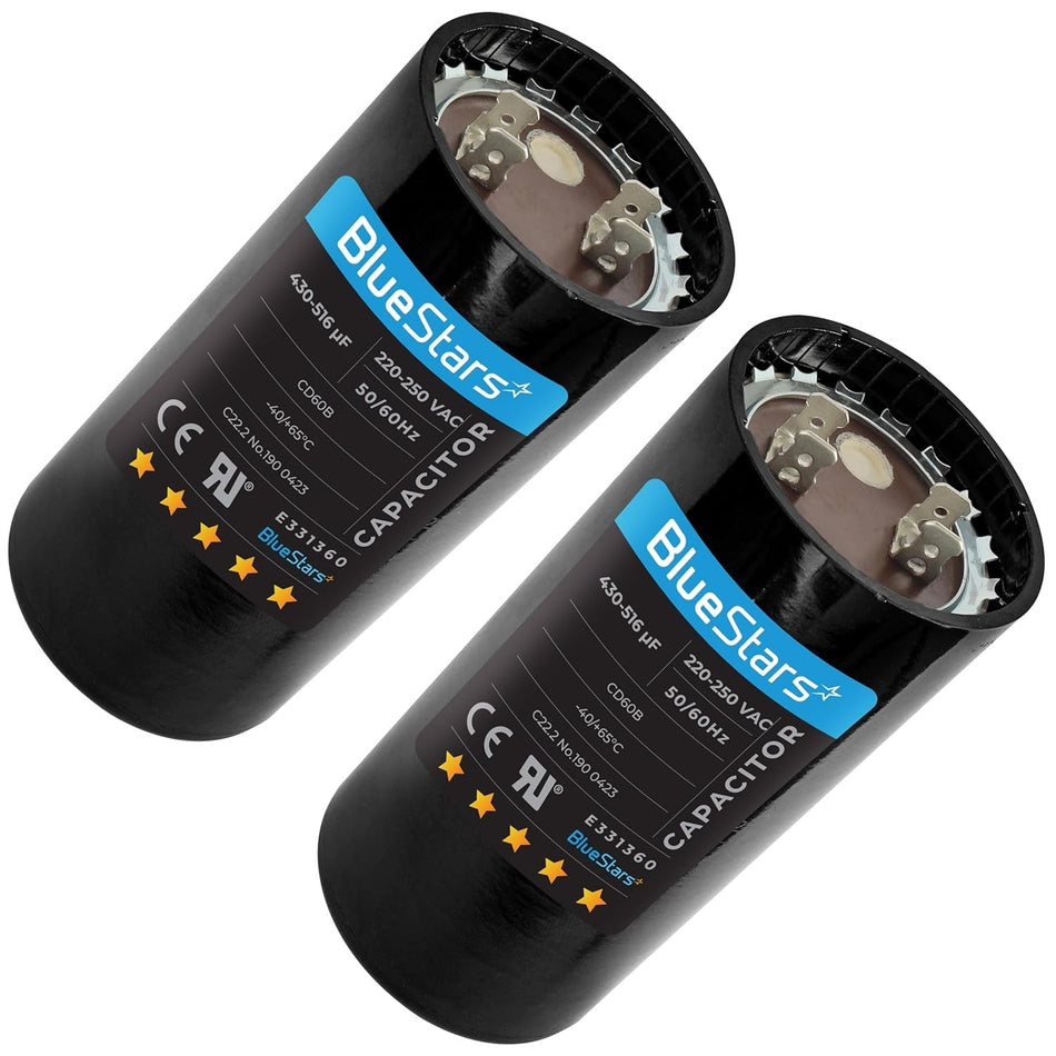 Two BlueStars 430-516 uF 220-250 VAC round start capacitors for single-phase electric motors.