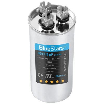 30+7.5 uF dual run round capacitor for condenser and heat pump units with terminal connectors.