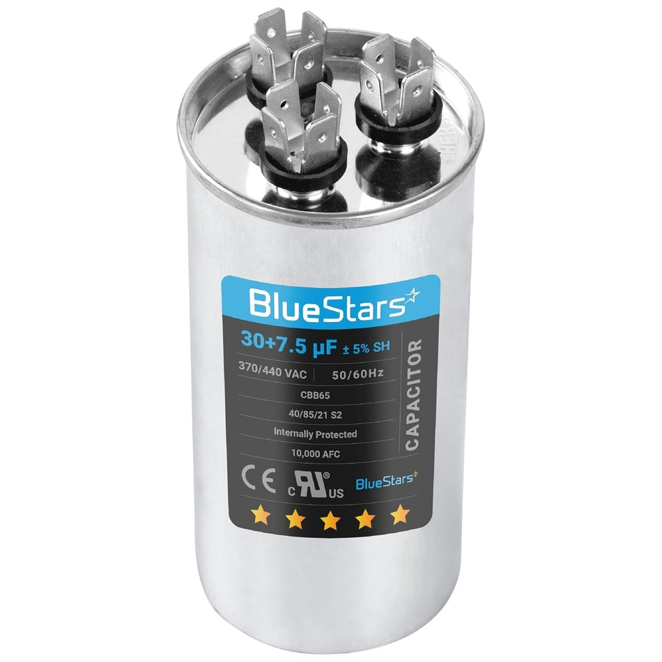 30+7.5 uF dual run round capacitor for condenser and heat pump units with terminal connectors.