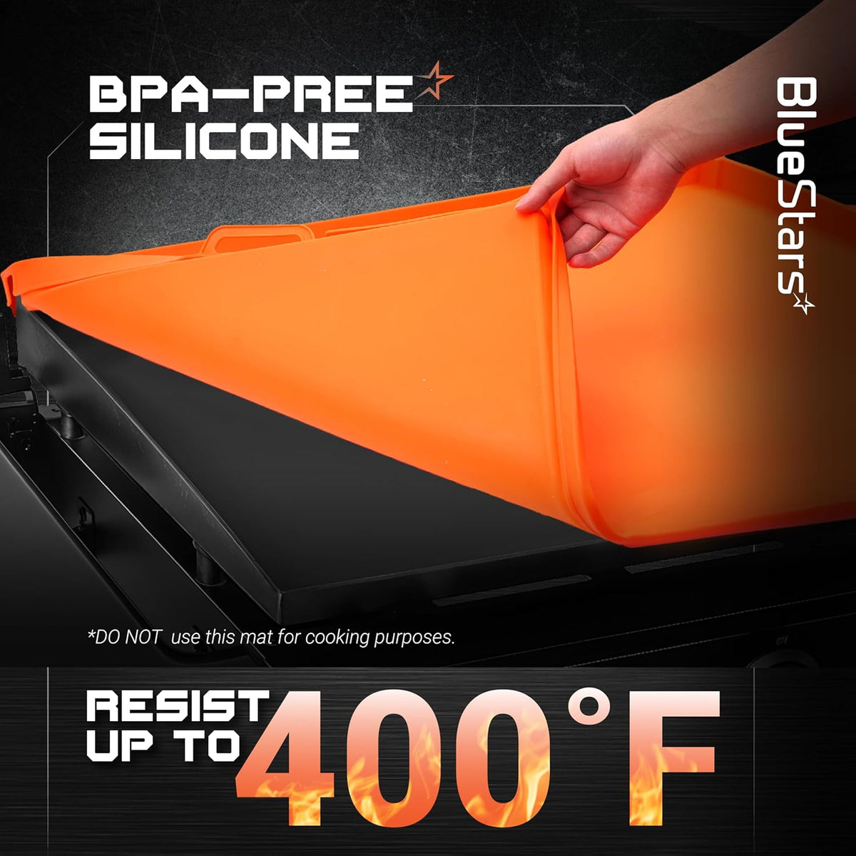 Hand lifting an orange 36-inch BPA-free silicone griddle cover off a black grill surface.