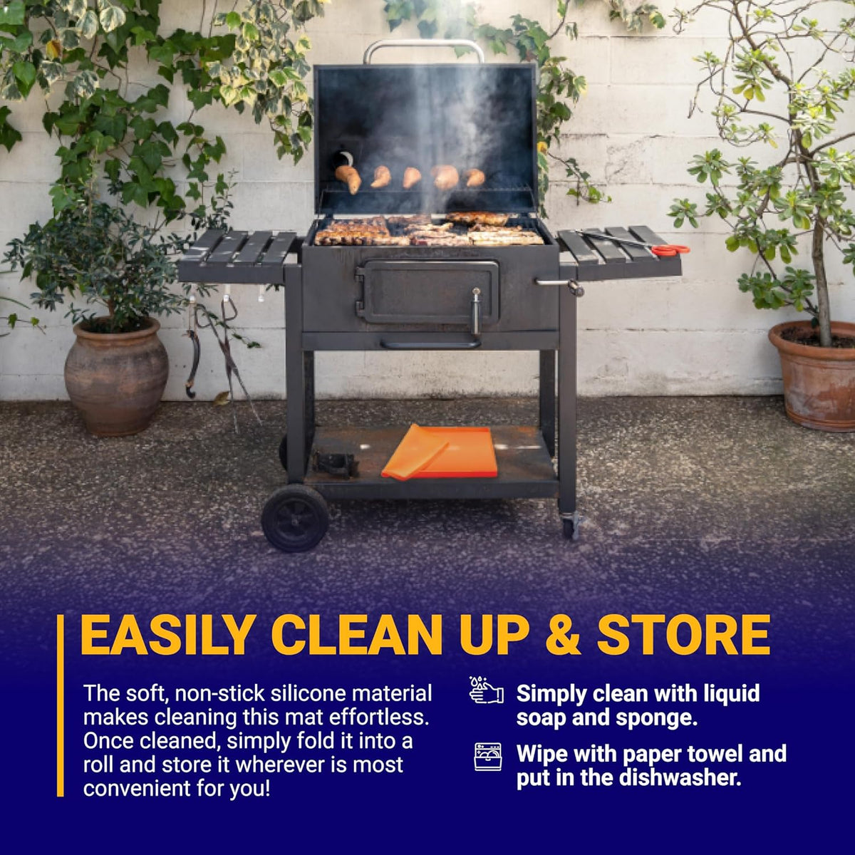 Orange 22-inch silicone griddle mat folded on the bottom shelf of a charcoal grill.