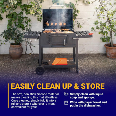 Orange 22-inch silicone griddle mat folded on the bottom shelf of a charcoal grill.