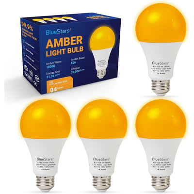 Four BlueStars 9W A19 amber LED sleep light bulbs with E26 bases and their product packaging box.
