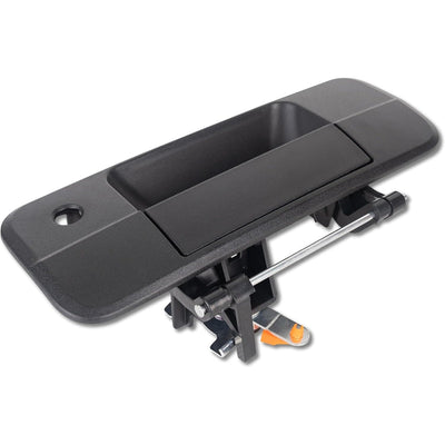Black textured tailgate handle for Toyota with integrated latch mechanism and keyhole.