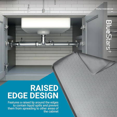 Grey 34" x 22" under sink mat with raised edge design for spill protection inside kitchen cabinet.