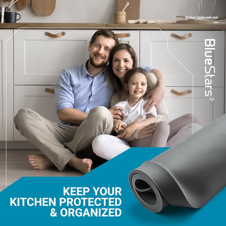 Rolled grey 34" x 22" under sink mat for kitchen cabinet protection shown with a family in the background.