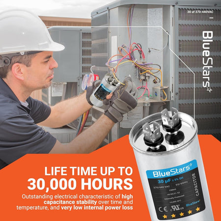 Technician installing a 30 uF 370/440 VAC round motor run capacitor into an air conditioner unit.