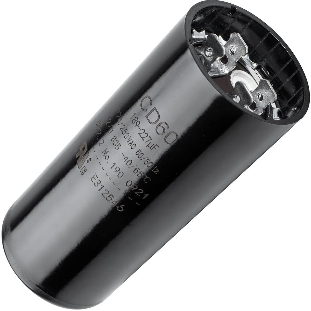 Black round start capacitor 189-227 uF 220-250 VAC for electric motors showing terminal top view.