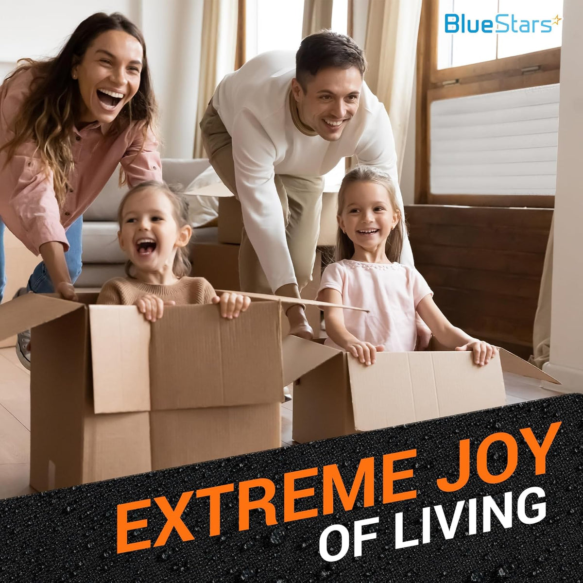 Family playing with cardboard boxes in a room with a white indoor window air conditioner cover installed.